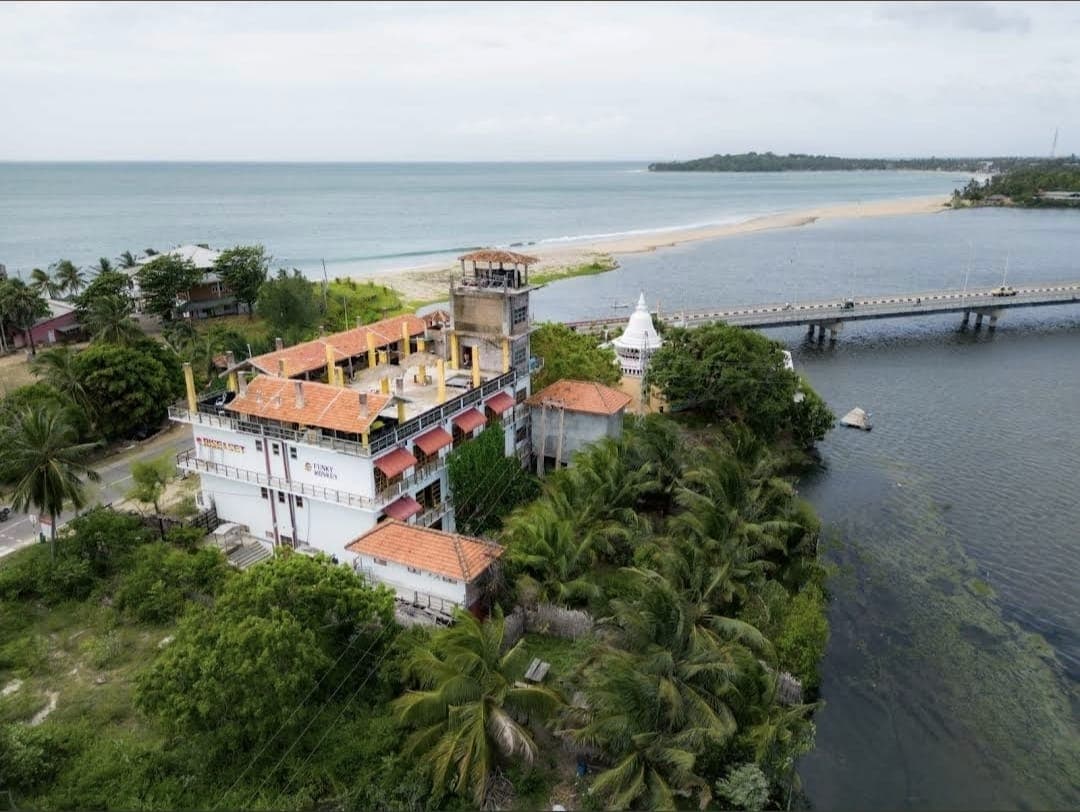 Twin room with colorful Sri Lankan textiles