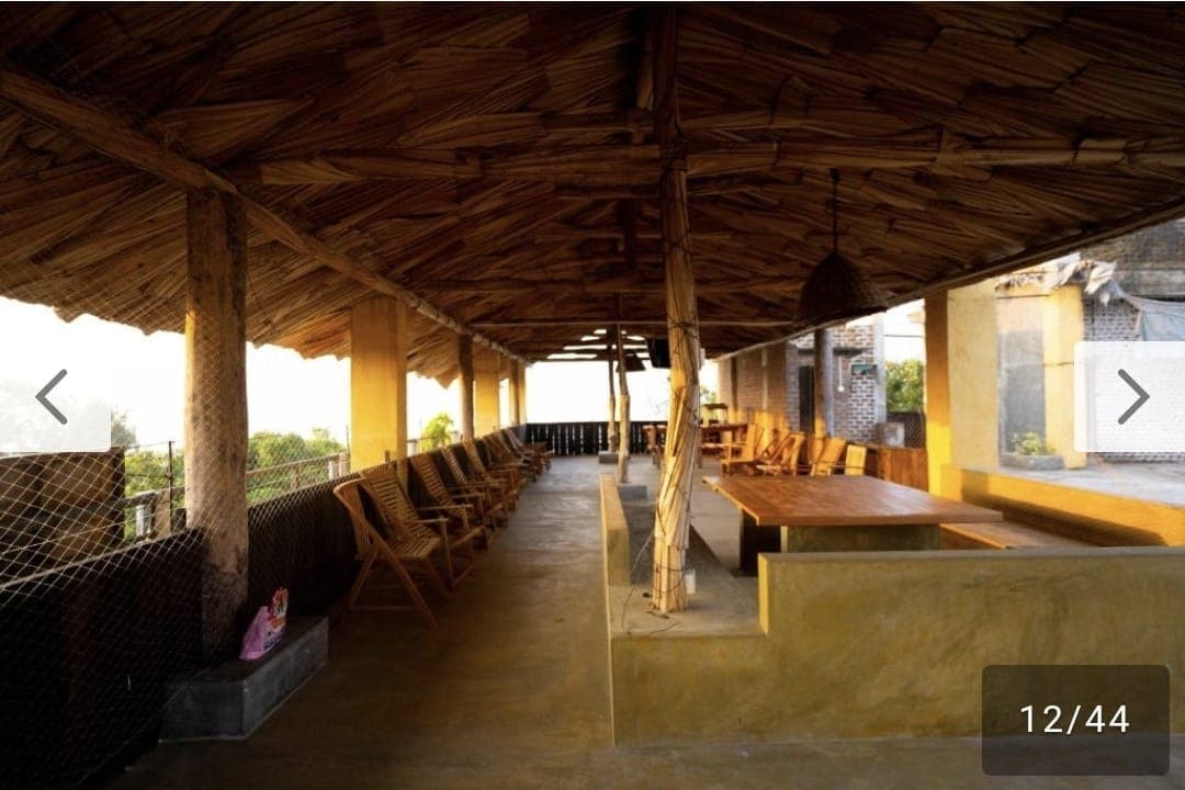 Room with private balcony and ocean view seating