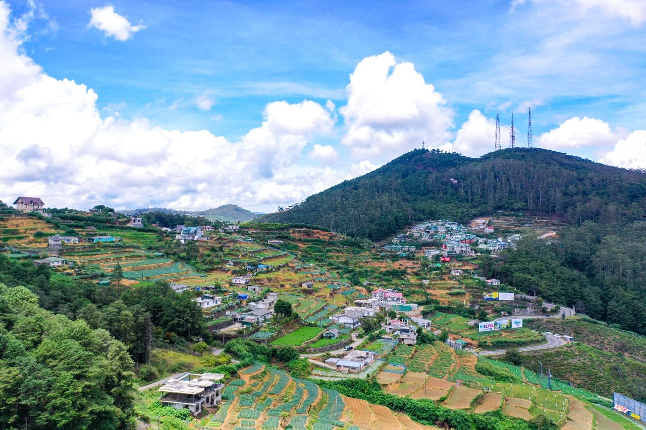 Outdoor dining terrace with panoramic mountain views